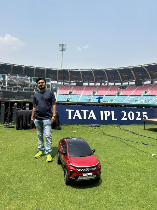 With the Tata Curvv toss car at Tata IPL 2025
