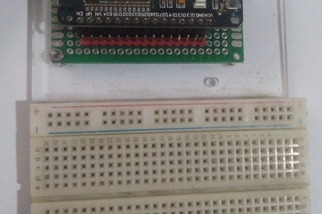 An ESP32 development board on a breadboard