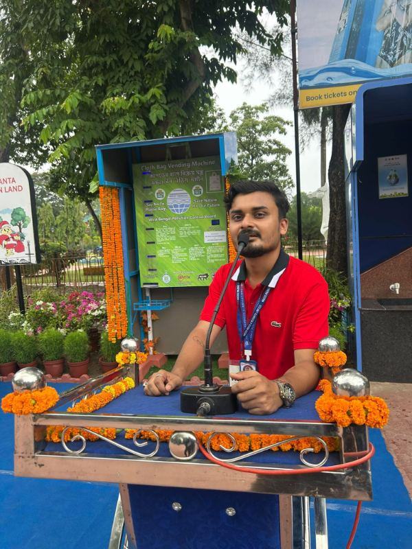 Arijit Das with the cloth bag vending machine on launch day