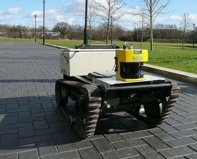 A tracked mobile robot carrying a LiDAR sensor